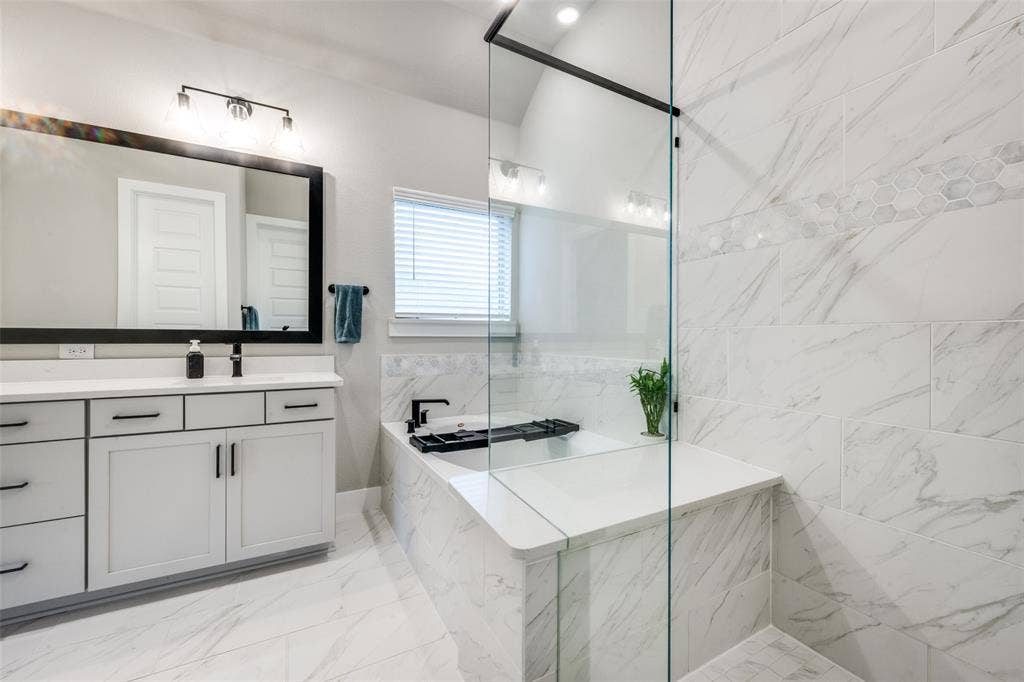 2801 Bedford Road, Northlake, TX 76226 The perfect place to relax after a long day. Beautiful tile and cabinets add luxury to the comfort.