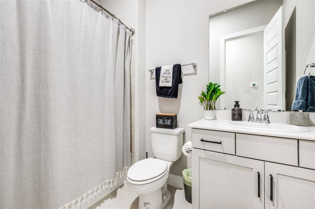 2801 Bedford Road, Northlake, TX 76226 All bathrooms feature modern cabinets and counter tops. This one is ideal for your guests!