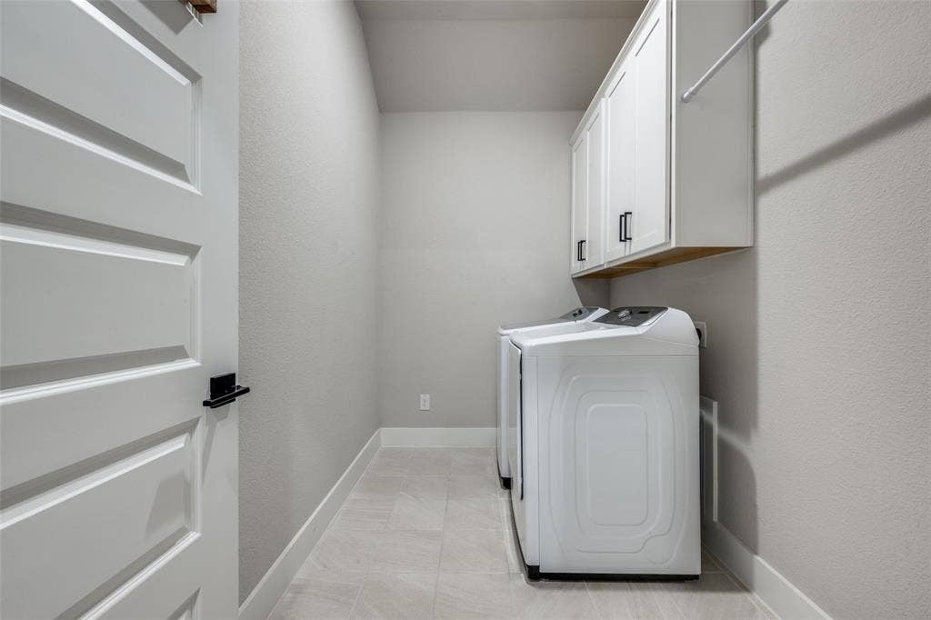 2801 Bedford Road, Northlake, TX 76226 The laundry space is designed to accomodate the whole process in one room. Wash, dry, fold, hang. Or maybe keep an extra refrigerator/freezer in here.