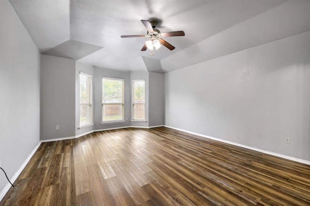 1513 Vermont Avenue, Lancaster, TX 75134 Primary bedroom offering natural light