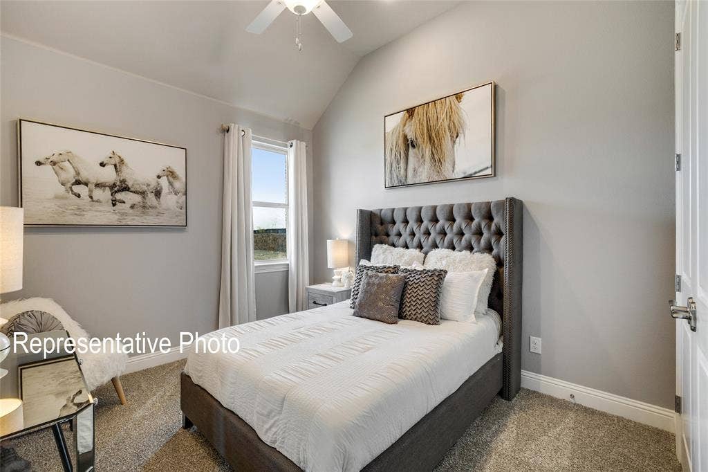 1415 Odette Drive, Arlington, TX 76013 Bedroom featuring a vaulted ceiling with a ceiling fan, a window providing natural light, and carpeted flooring