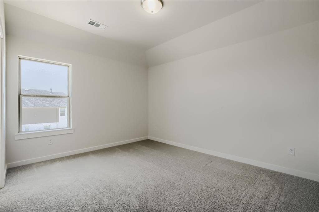 828 Stone Grove Road, Lavon, TX 75166 Room featuring light grey carpeting, white baseboards, and neutral wall paint