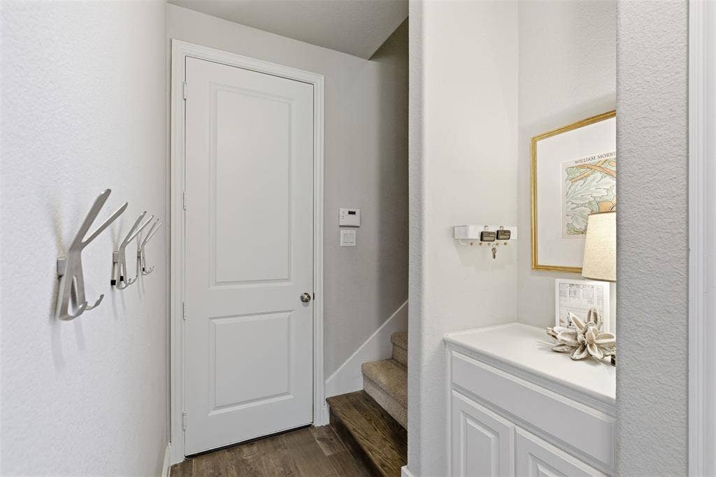 11414 Alejandra Lane, Frisco, TX 75035 Garage entry with access to the back staircase