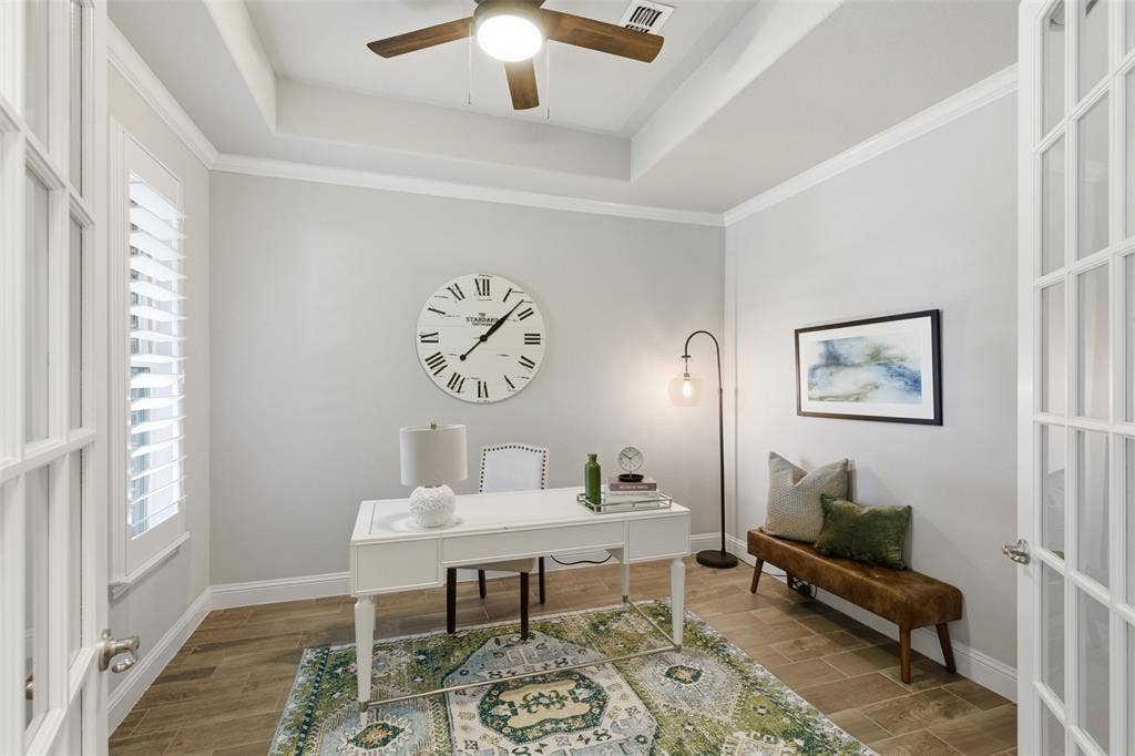 11414 Alejandra Lane, Frisco, TX 75035 Room with wood-finish flooring, white walls, and a tray ceiling