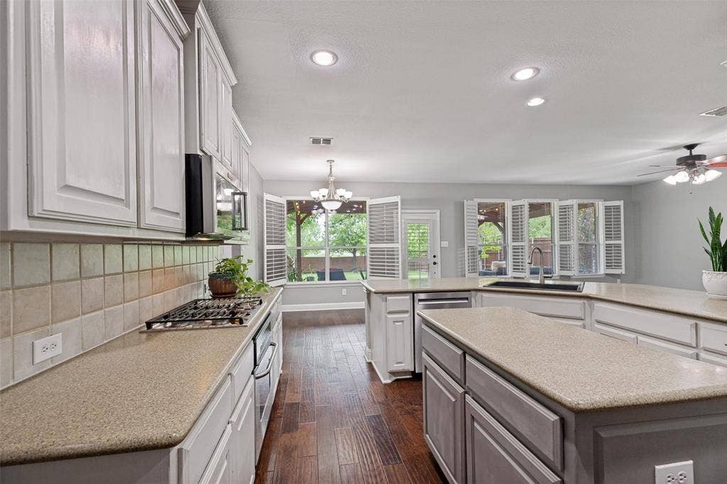 Recessed lighting package makes for a light and bright kitchen.