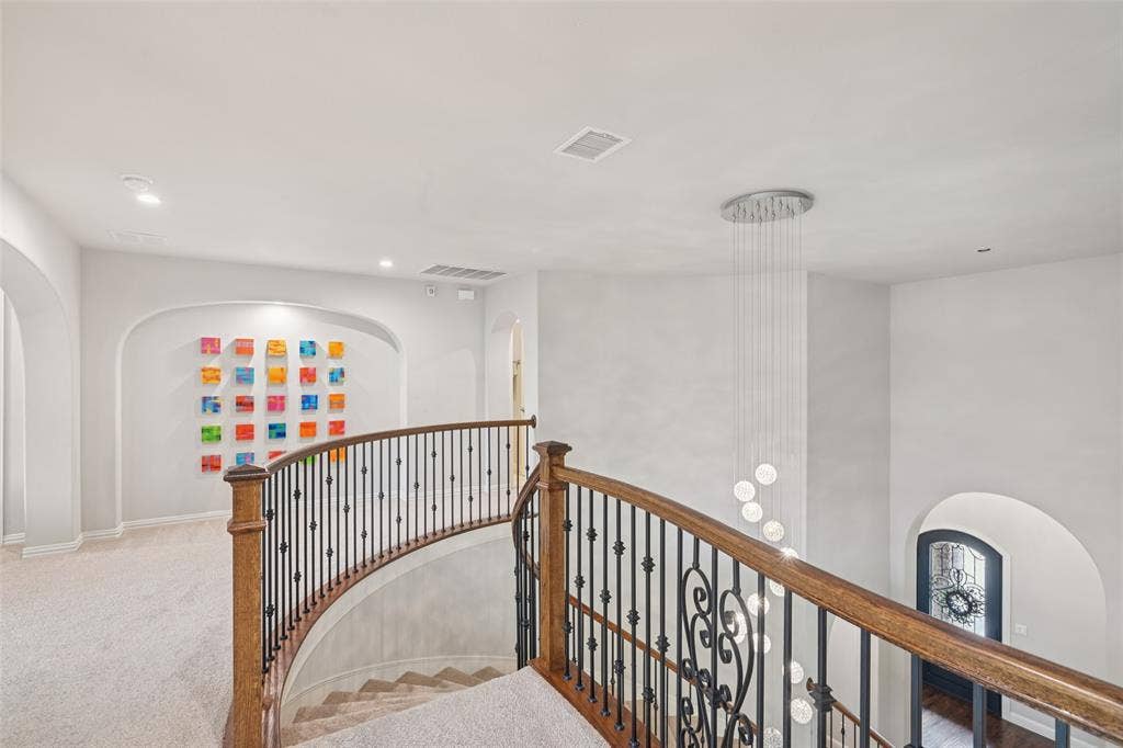2731 Dames Lane, Irving, TX 75063 Grand staircase flowing to bonus room and media room + bedrooms