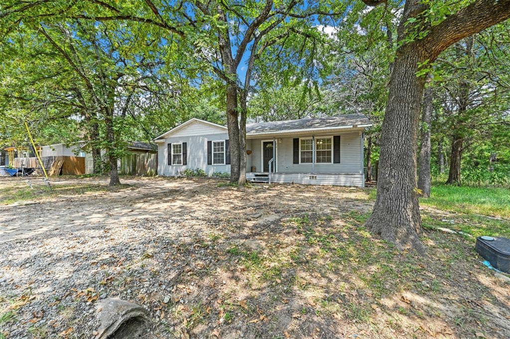 214 Wildflower Drive, Gun Barrel City, TX 75156 View of ranch-style home