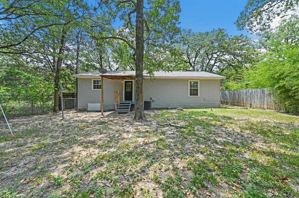 214 Wildflower Drive, Gun Barrel City, TX 75156 View of rear view of property