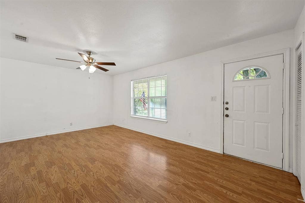 214 Wildflower Drive, Gun Barrel City, TX 75156 Foyer entrance featuring ceiling fan and wood-type flooring