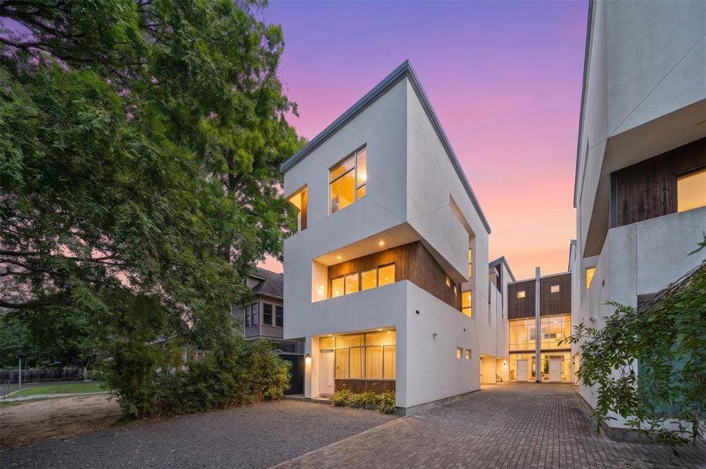 505 W Alabama Street, #C, Houston, TX 77006 Modern architectural facade featuring white stucco and warm wood paneling