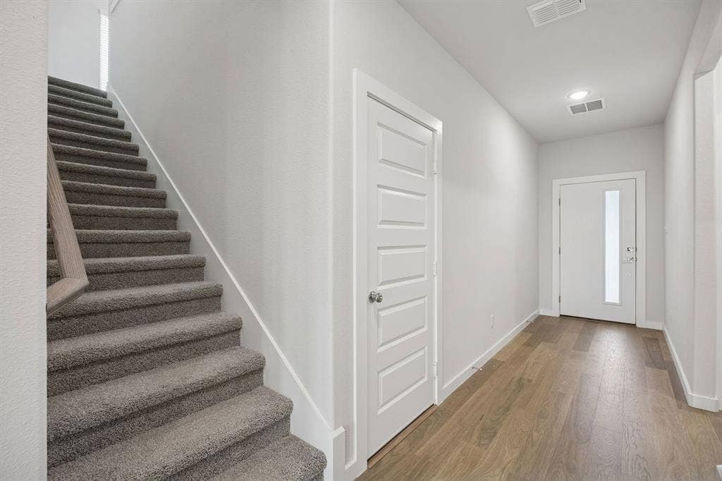 489 Hocking Hills Drive, Waxahachie, TX 75165 Entryway in the Masters home plan by Trophy Signature Homes – REPRESENTATIVE PHOTO