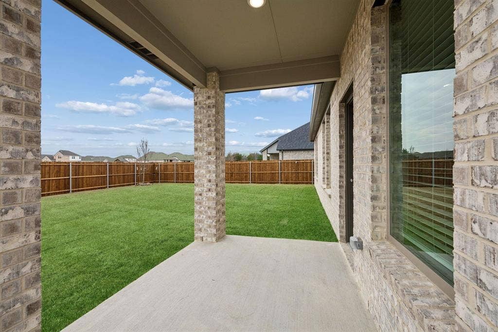 489 Hocking Hills Drive, Waxahachie, TX 75165 Covered Patio in the Masters home plan by Trophy Signature Homes – REPRESENTATIVE PHOTO