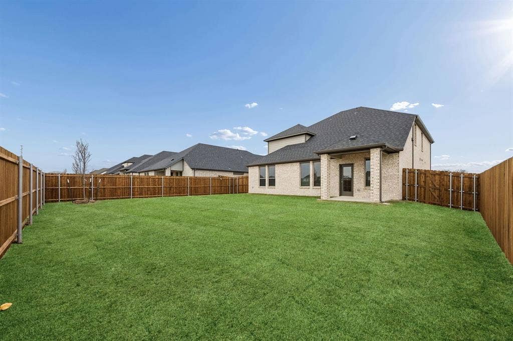 489 Hocking Hills Drive, Waxahachie, TX 75165 Covered Patio in the Masters home plan by Trophy Signature Homes – REPRESENTATIVE PHOTO
