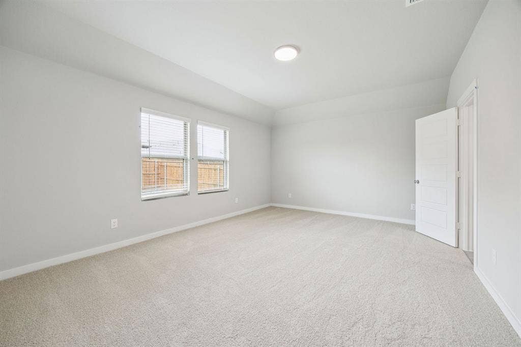 Primary Suite in the Hayden home plan by Trophy Signature Homes – REPRESENTATIVE PHOTO