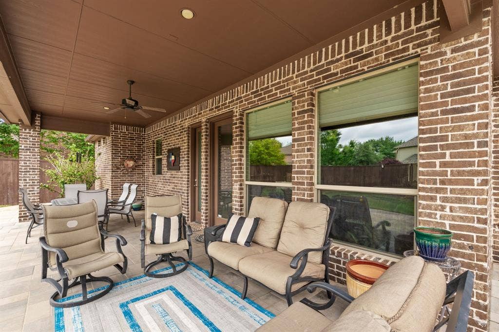 1640 Stillhouse Hollow Drive, Prosper, TX 75078 View under the covered patio which showcases the ability to seat and entertain many guests.