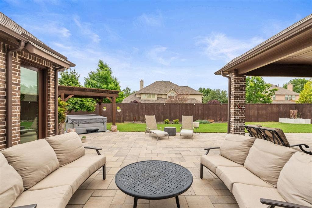 1640 Stillhouse Hollow Drive, Prosper, TX 75078 View of the open patio looking towards the rear yard.