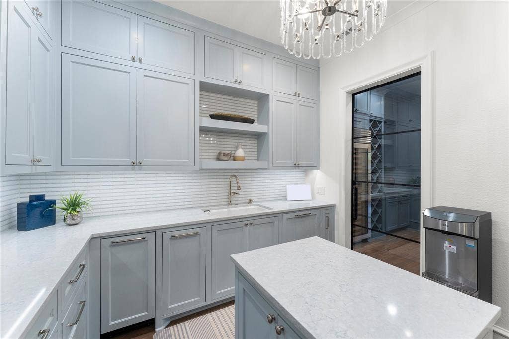 Complete with 2nd fridge, ice machine, 2nd dishwasher, another microwave and oven....superb! ALL NEW!