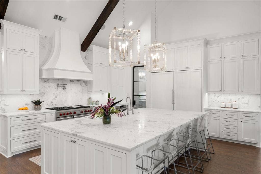 Gorgeous italian marble and custom cabinet with oversized sub zero fridge- 4 ovens, 2 dishwashers and MORE!