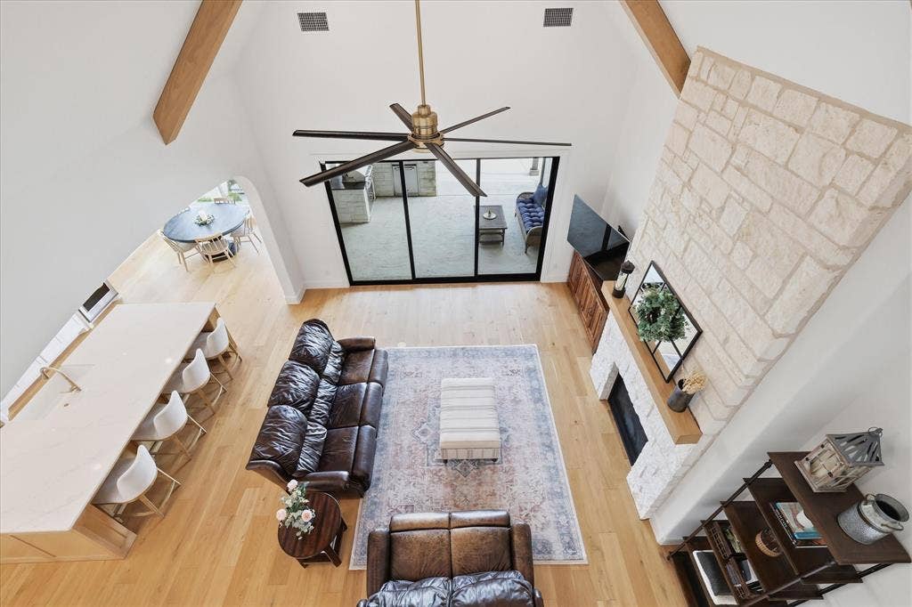 Great room with vaulted ceilings and exposed wood beams