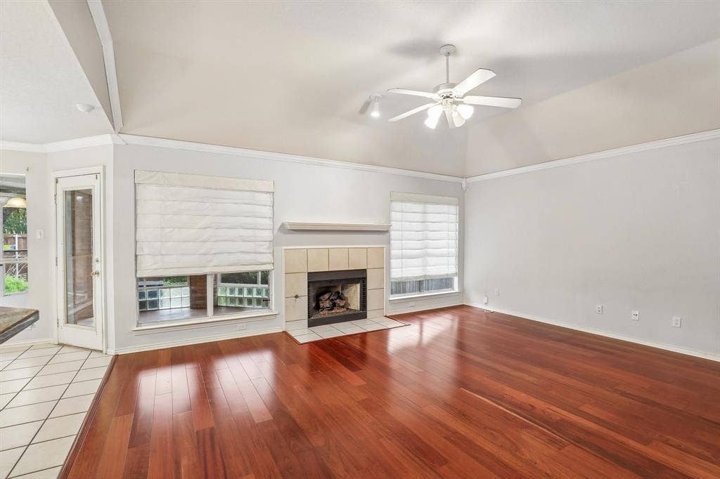 4124 Cory Lee Court, Arlington, TX 76015 Living area featuring rich wood-finish flooring and a vaulted ceiling