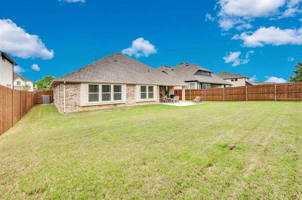 922 Cardinal Drive, Midlothian, TX 76065 AC unit securely behind fence