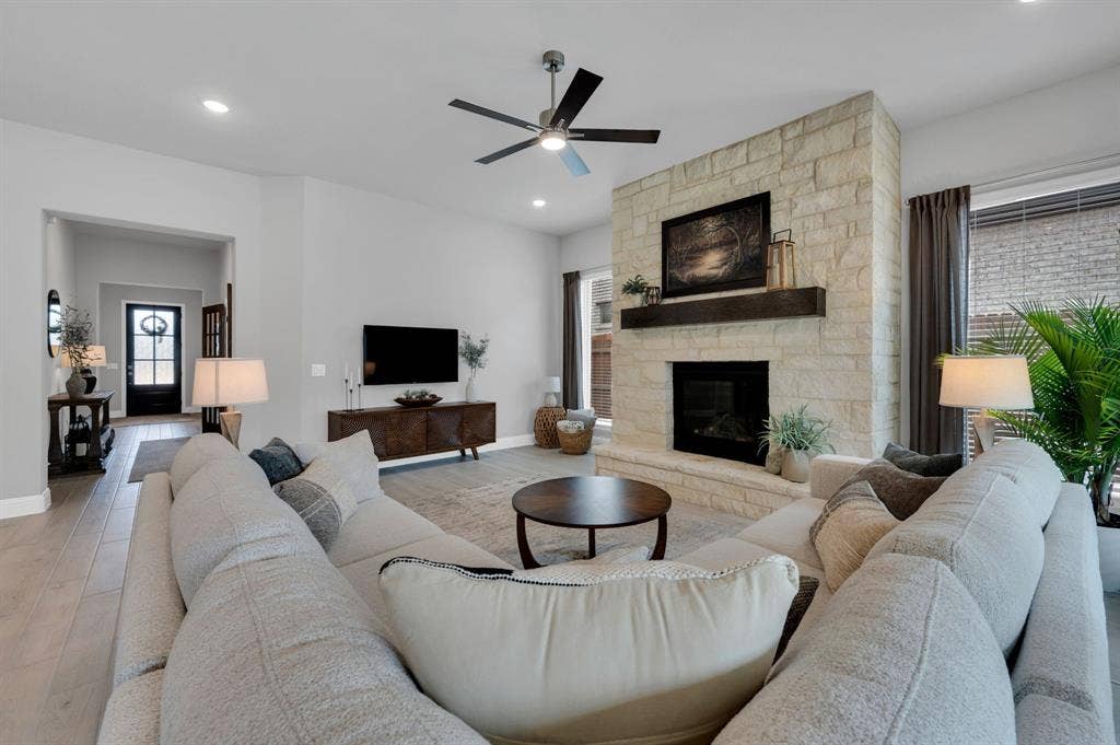 922 Cardinal Drive, Midlothian, TX 76065 Gorgeous living room centered around fireplace