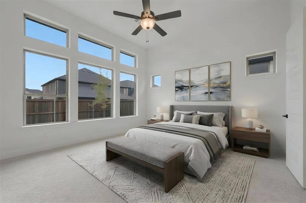 1605 Cedarberry Drive, Northlake, TX 76226 Room featuring high ceilings, multiple transom windows, an additional window, and a ceiling fan with integrated lighting