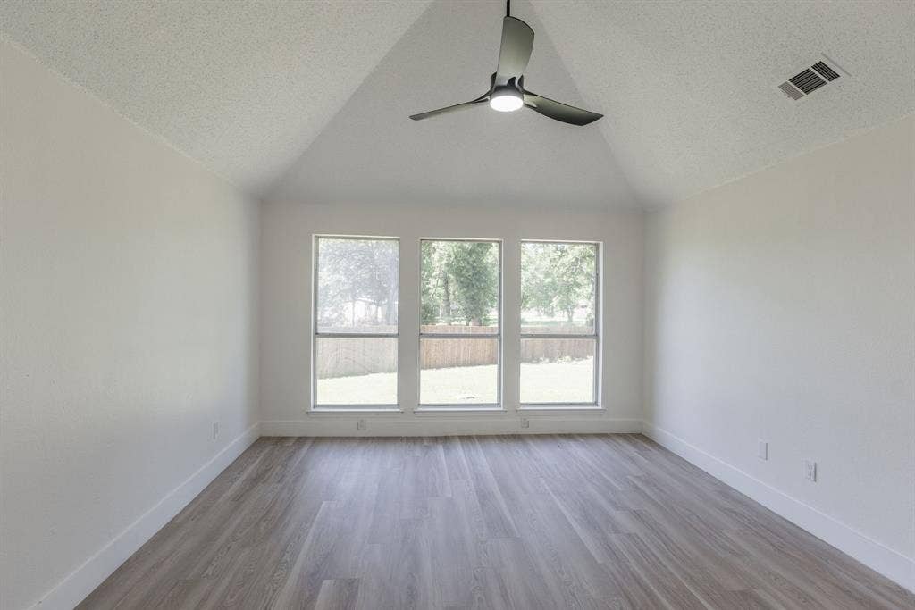 Vaulted ceiling accenting a contemporary ceiling fan