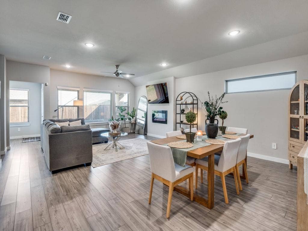 626 Congressional Avenue, Red Oak, TX 75154 Open-concept living and dining area featuring wood-finish flooring, recessed lighting, and a ceiling fan