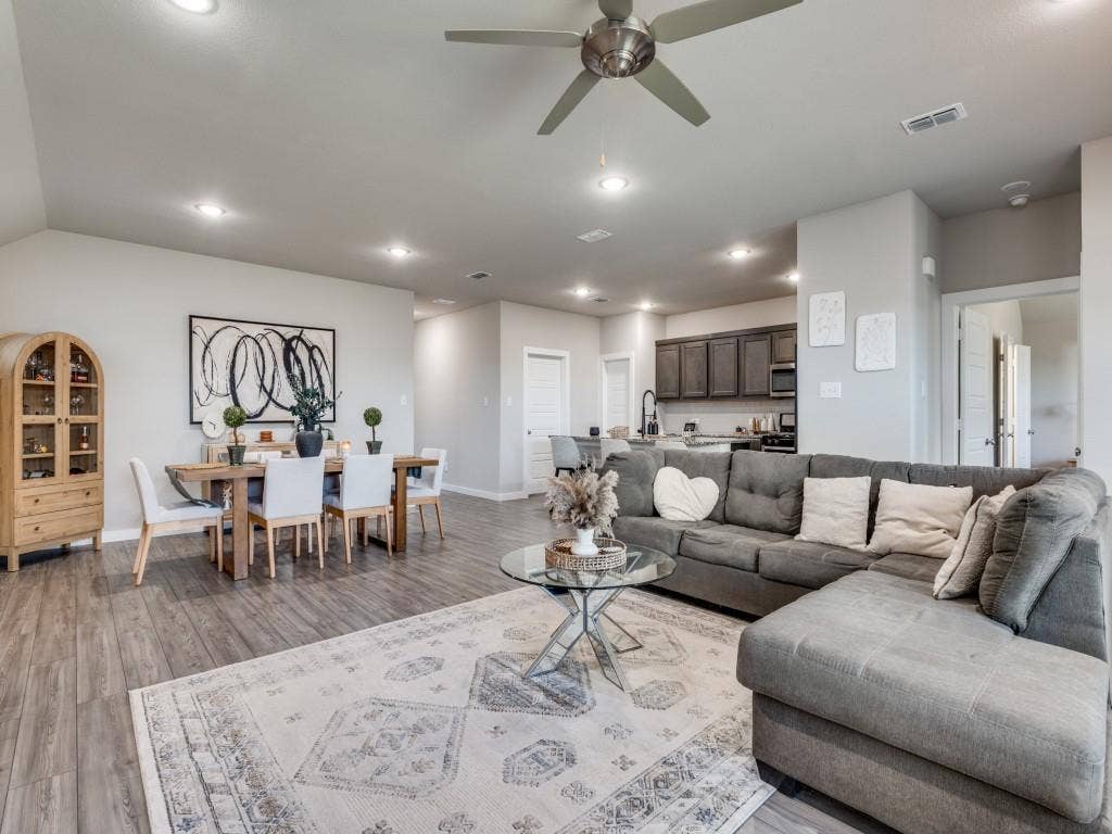 626 Congressional Avenue, Red Oak, TX 75154 Open concept living and dining area featuring wood-finish flooring, recessed lighting, and a ceiling fan