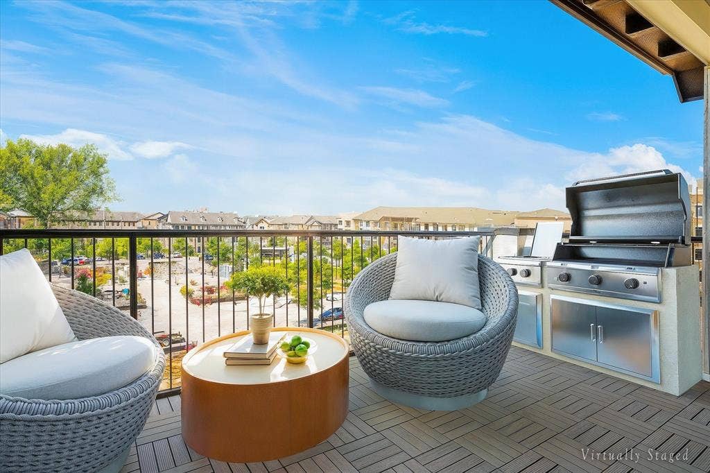14956 Oak Street, Addison, TX 75001 Spacious balcony featuring tile flooring and a built-in outdoor kitchen with a stainless steel grill