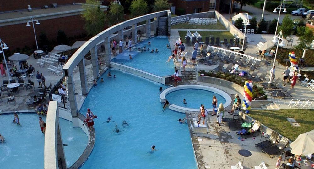 14956 Oak Street, Addison, TX 75001 Expansive aquatic amenity featuring multiple pool areas and a circular spa