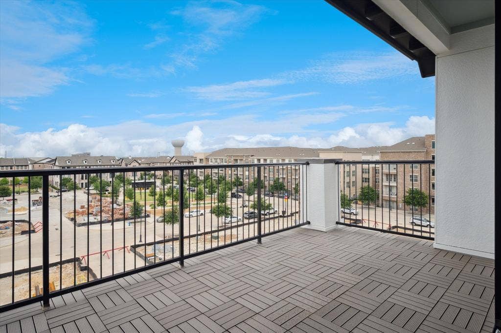 14956 Oak Street, Addison, TX 75001 Private balcony featuring grey composite decking and black metal railings