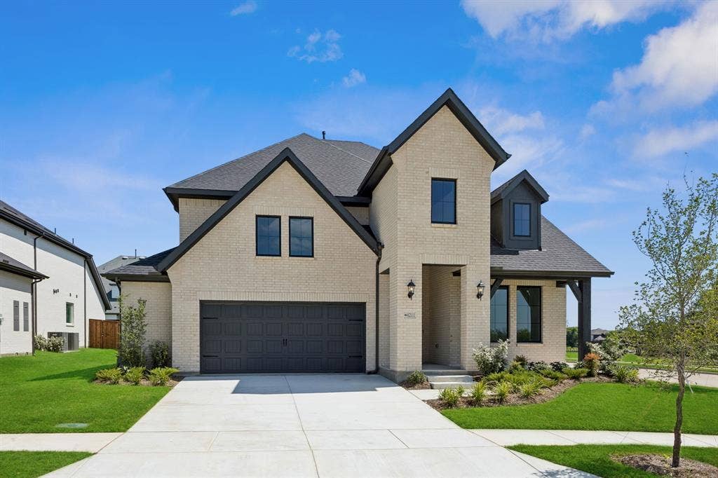 4211 Rosita Lane, Prosper, TX 75078 Featuring striking gables and a charming front porch, you'll enjoy wonderful curb appeal in this dream home!