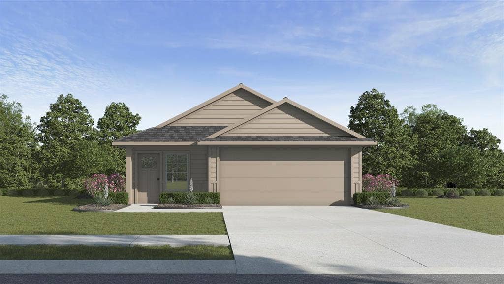 1647 Blaire Drive, Tyler, TX 75702 Single-story residence featuring a two-car garage, neutral-toned siding, and a gabled roofline