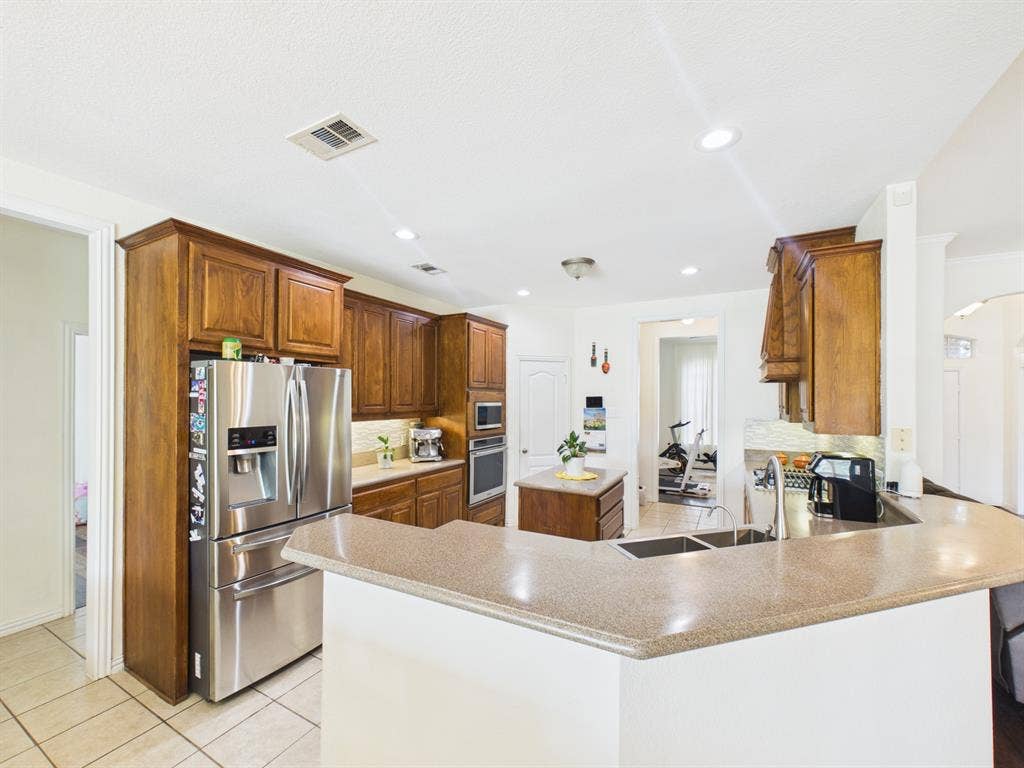 5640 Jennifer Lane, Midlothian, TX 76065 You can put barstools here for extra seating