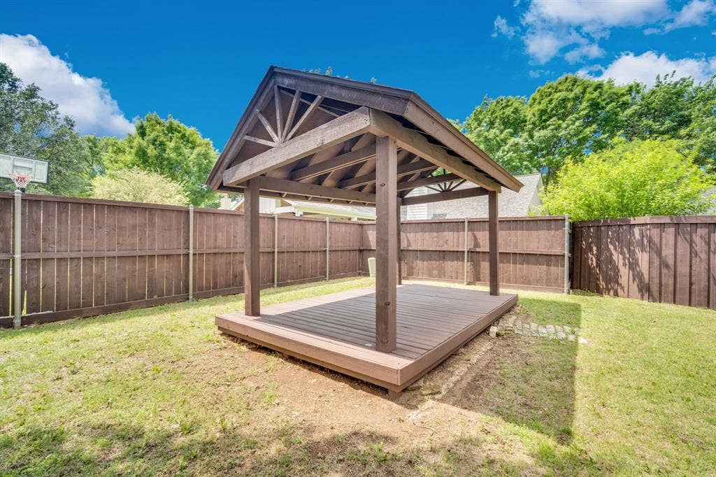 506 Whitney Drive, Midlothian, TX 76065 Freestanding gazebo with a pitched roof and a composite deck base