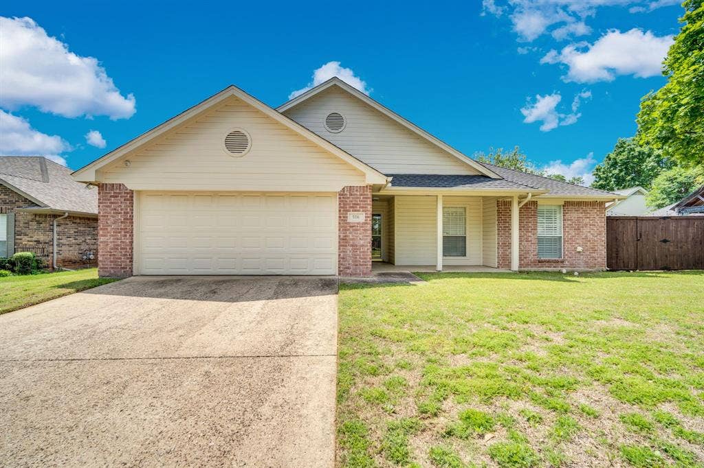 506 Whitney Drive, Midlothian, TX 76065 Brick and siding exterior with a covered front porch freshly powerwashed after photos were taken