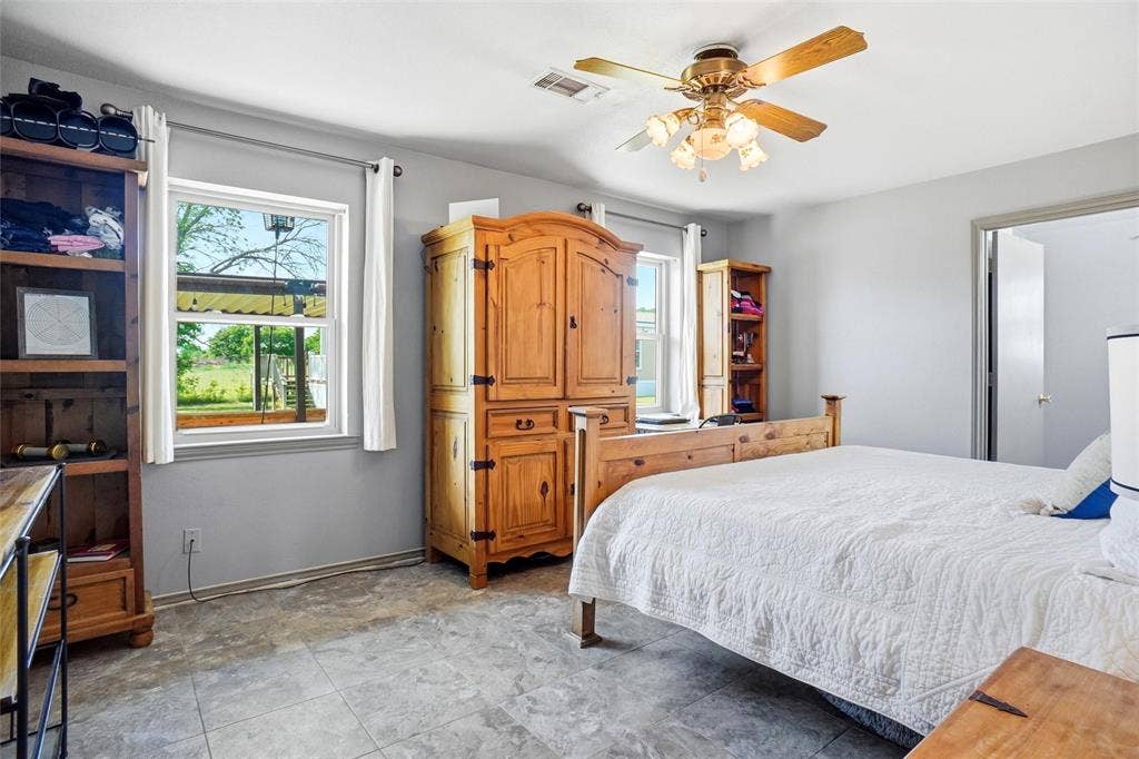 8983 W Odneal Road, Krum, TX 76249 Primary bedroom in house #1.