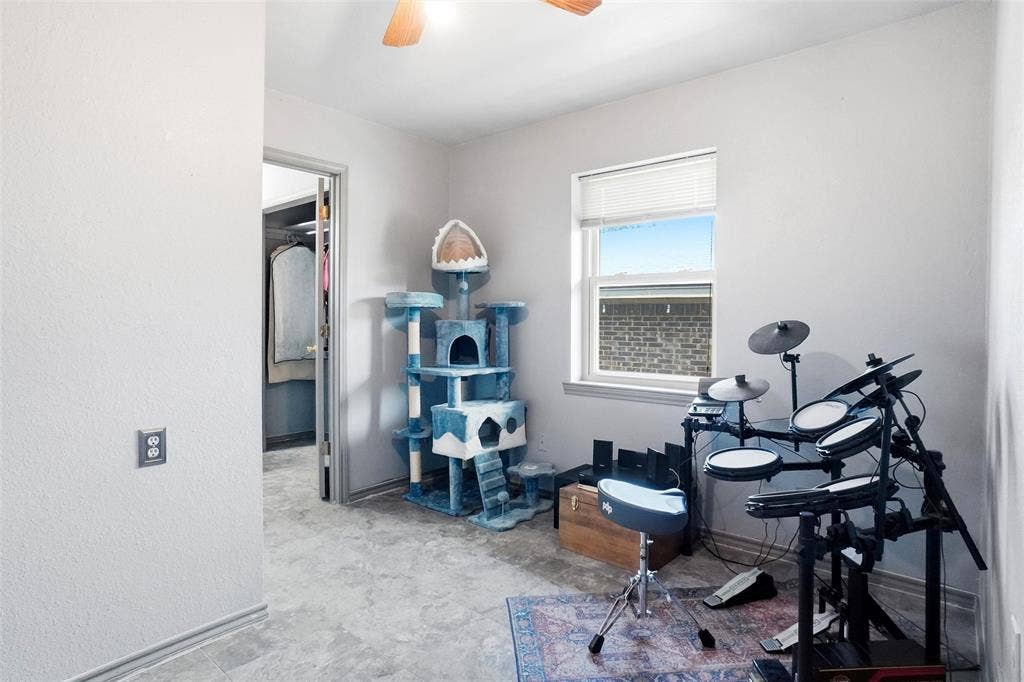 8983 W Odneal Road, Krum, TX 76249 Secondary bedroom in house #1. Full bathroom with this bedroom.