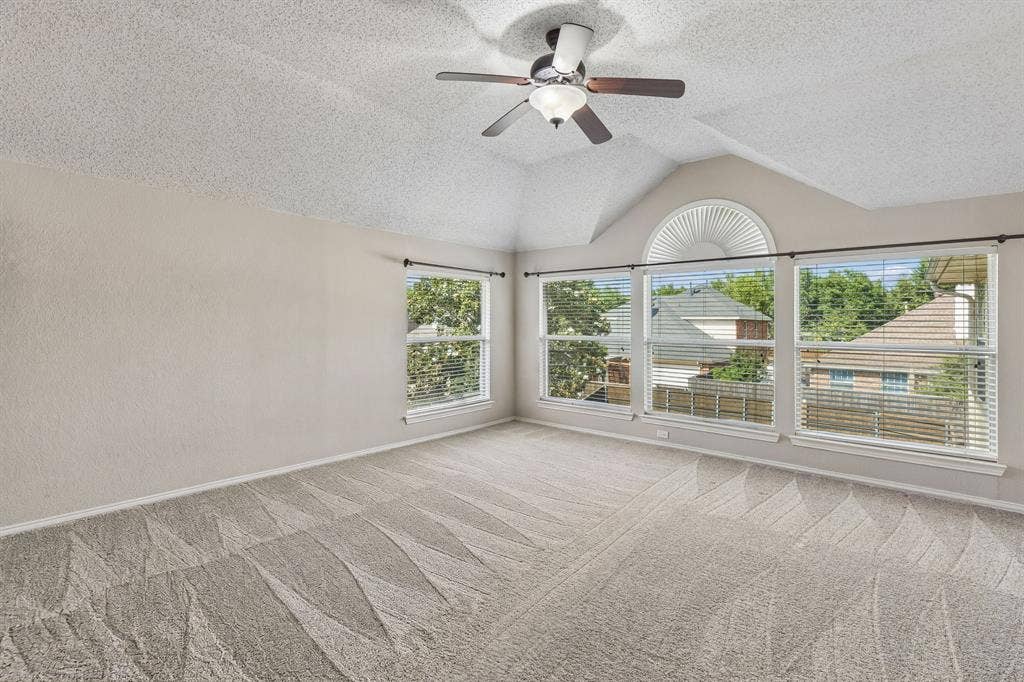 1105 Easton Lane, Allen, TX 75002 Find this large game room on the second floor. The space offers a wall of windows, ceiling fan and carpet.