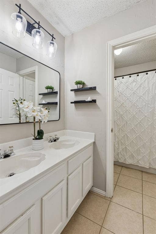 1105 Easton Lane, Allen, TX 75002 Second story hall bath has dual vanity and a separate room for the shower/tub combo and the water closet for added privacy.