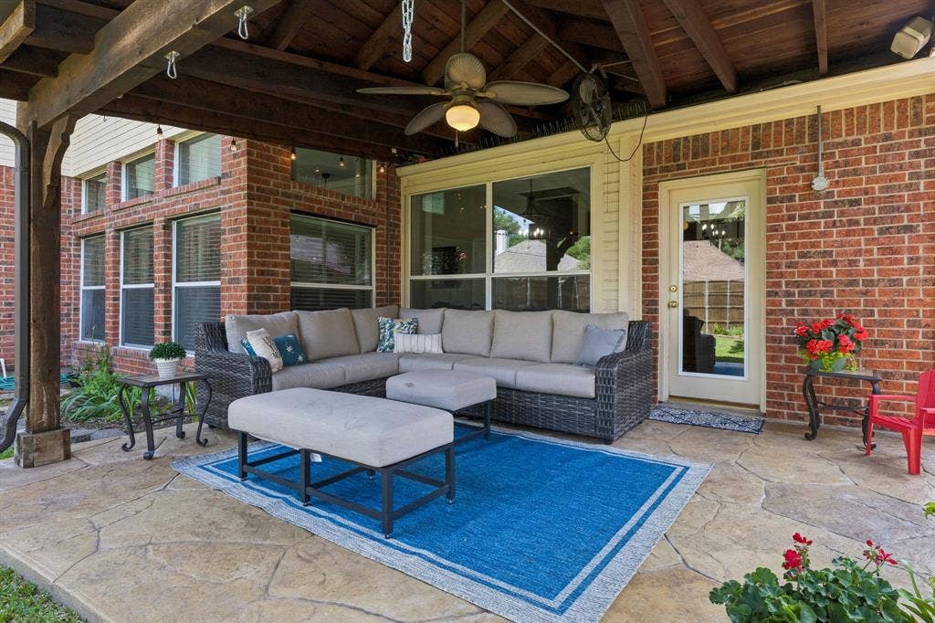 1105 Easton Lane, Allen, TX 75002 Enjoy outdoor living on the 17'x12' covered patio. The stained cedar patio cover has ceiling fan.