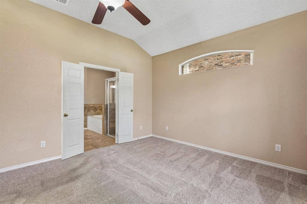 1105 Easton Lane, Allen, TX 75002 Access the spacious primary bath through french doors. The space also has a large walk in closet.