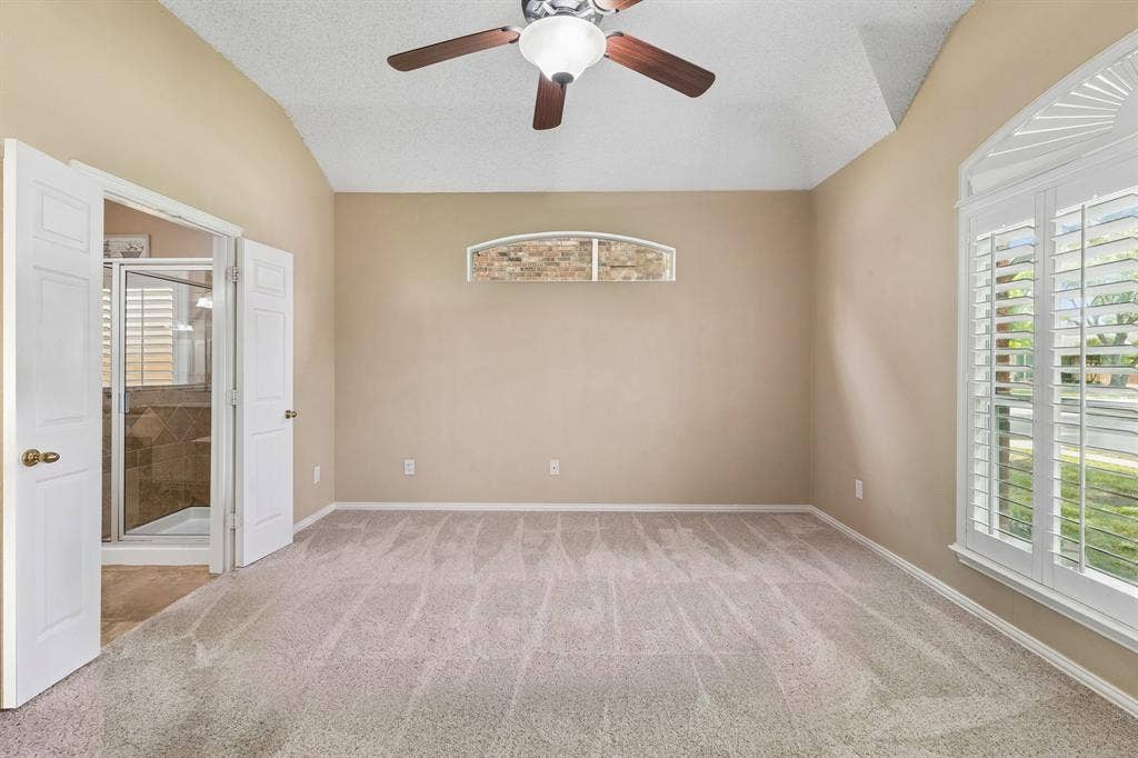 1105 Easton Lane, Allen, TX 75002 Spacious primary retreat, on the first floor, has great natural light, plantation shutters and large en suite bathroom.