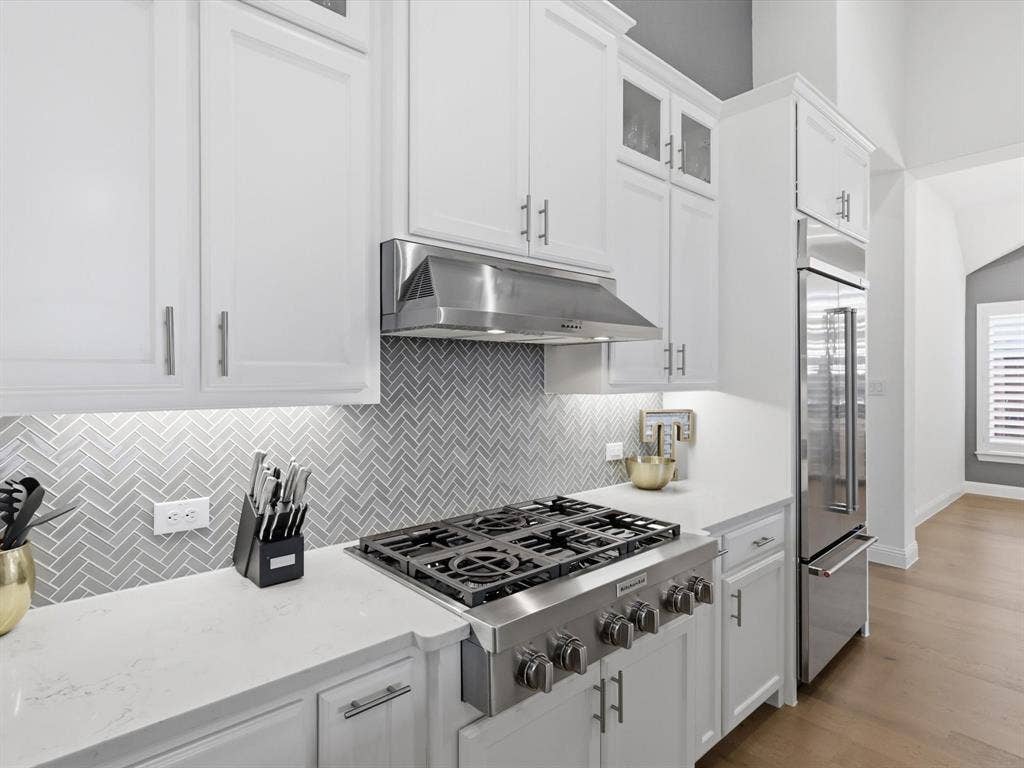 Bright kitchen with natural light, generous storage, and open-concept design.