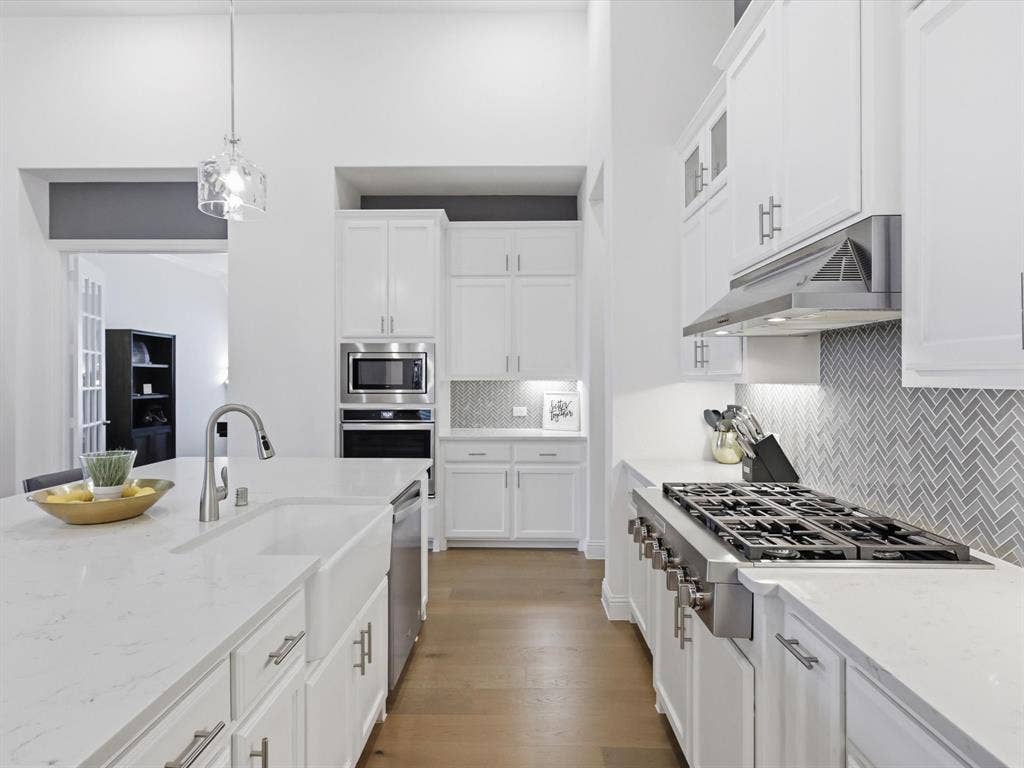 Kitchen designed for both function and style with upgraded finishes throughout.