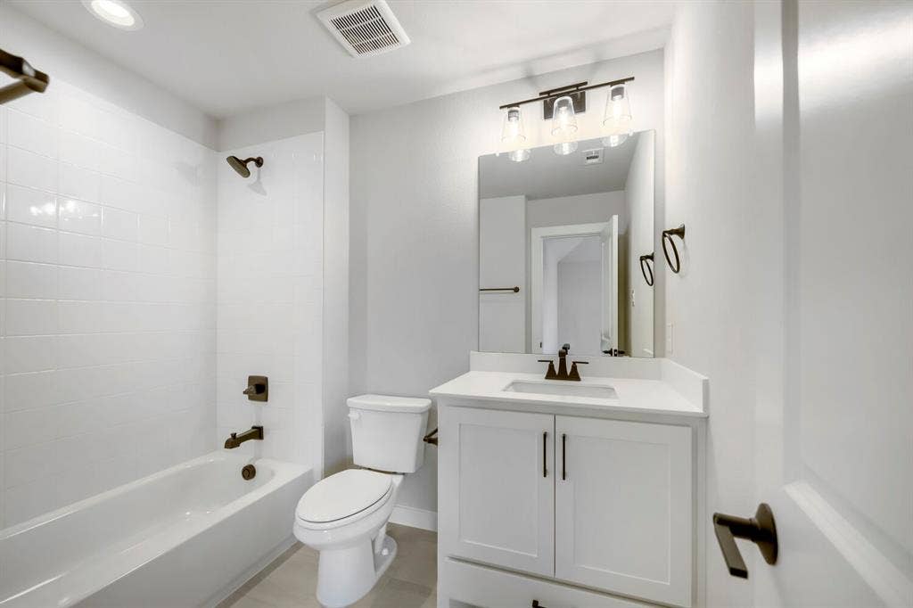 800 Blackberry Road, Haslet, TX 76052 Bathroom featuring a white vanity with a rectangular undermount sink and a light-colored countertop