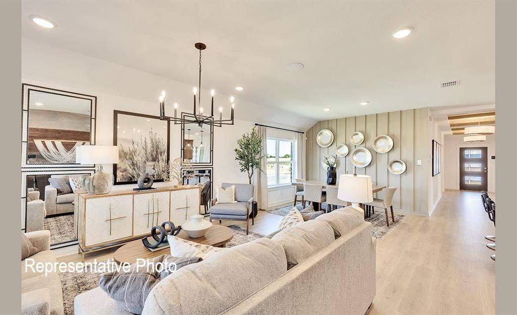 1579 Gentle Night Drive, Forney, TX 75126 Spacious interior featuring light wood-finish flooring, recessed lighting, and a modern chandelier