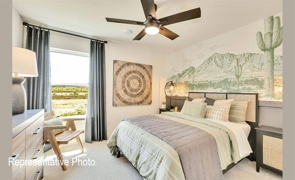 1579 Gentle Night Drive, Forney, TX 75126 Carpeted bedroom featuring a large window, ceiling fan with integrated lighting, and a decorative wall mural